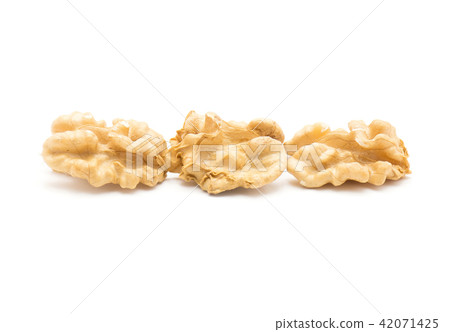Raw walnut isolated on white Raw walnut isolated on white 42071425