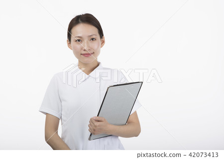 A woman in a white suit smiling with a medical record 42073413