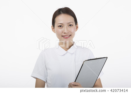 A woman in a white suit smiling with a medical record A woman in a white suit smiling with a medical record 42073414