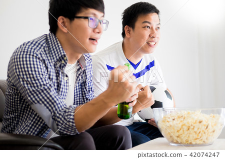 friendship, sports and entertainment concept - happy male friend friendship, sports and entertainment concept - happy male friend 42074247