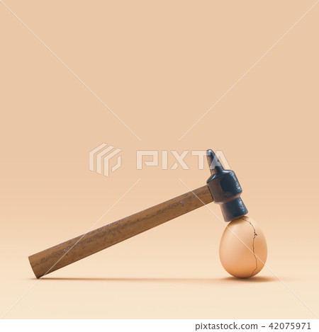 Cracked eggshell hit by hammer Cracked eggshell hit by hammer 42075971