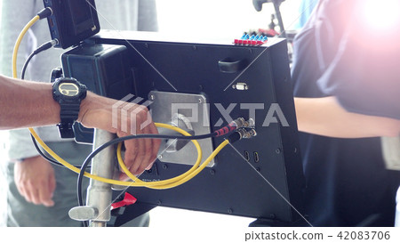 Video camera on professional tripod 42083706