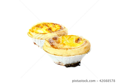 egg tart in foil on white isolated 42088578
