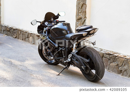 Modern sporbike parked in street Modern sporbike parked in street 42089105