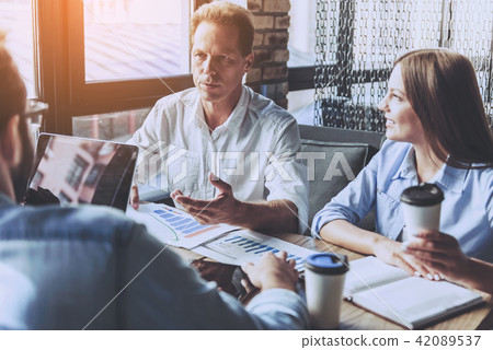 Business People in Casual Wear Discussing Affairs. 42089537