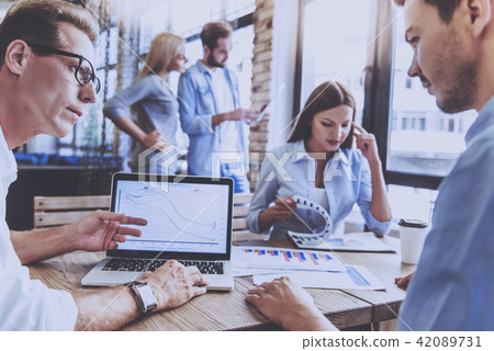 Handsome Man Gesticulates and Discusses Something. Handsome Man Gesticulates and Discusses Something. 42089731