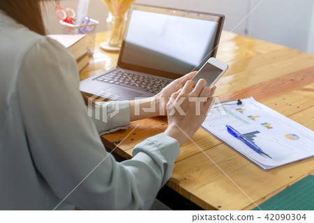 Beautiful young businesswoman is searching Beautiful young businesswoman is searching 42090304