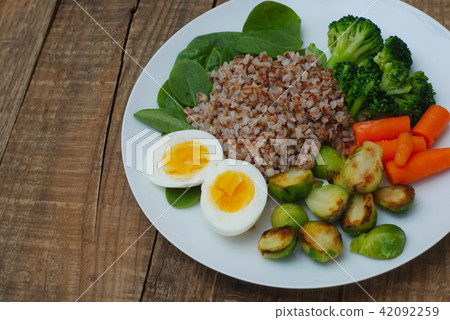 Healthy Diet Fitness Healthy Diet Buckwheat Egg Boiled Half Salad Brussele Cabbage Carrots Copy Healthy Diet Fitness Healthy Diet Buckwheat Egg Boiled Half Salad Brussele Cabbage Carrots Copy 42092259