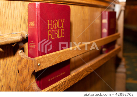 Holy books at church bench Holy books at church bench 42092702