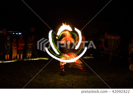 Beautiful fire show at night Beautiful fire show at night 42092822