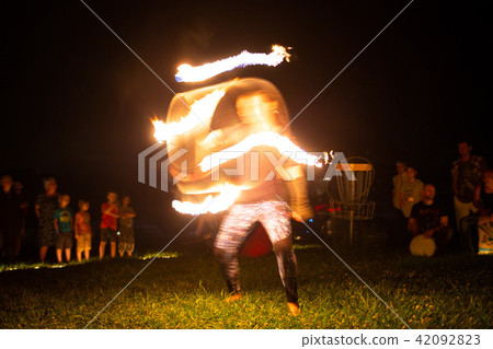 Beautiful fire show at night 42092823