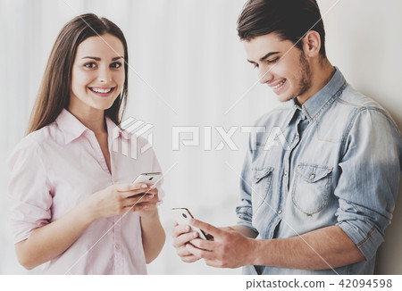 Two Beautiful Young Students Standing Together 42094598