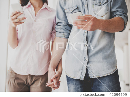 Young Students in Casual Clothes Holding Hands. Young Students in Casual Clothes Holding Hands. 42094599
