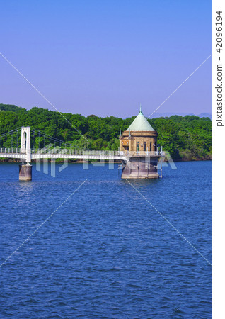 Sayama lake intake tower of fresh green Sayama lake intake tower of fresh green 42096194