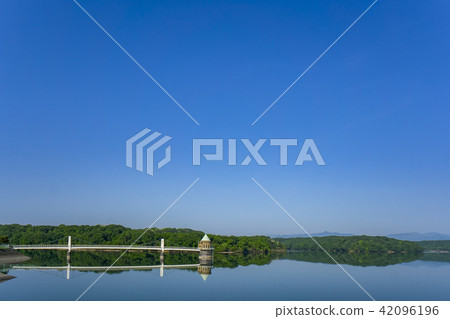 Sayama lake intake tower of fresh green Sayama lake intake tower of fresh green 42096196