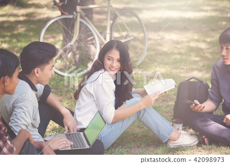 Group of university students working together 42098973