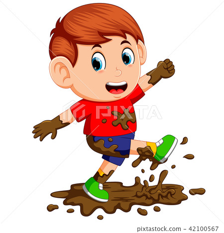 Little boy enjoy playing in the mud 42100567