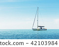Yacht in the sea against blue sky 42103984