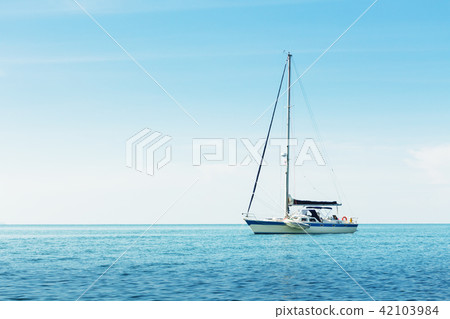 Yacht in the sea against blue sky Yacht in the sea against blue sky 42103984