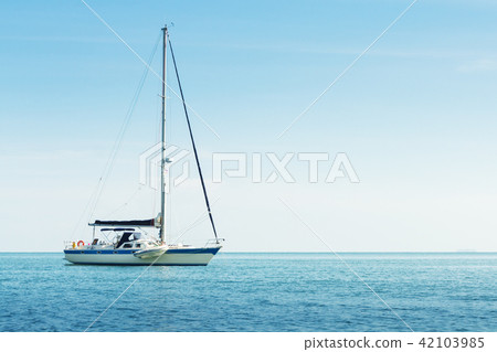 Yacht in the sea against blue sky 42103985