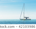 Yacht in the sea against blue sky 42103986