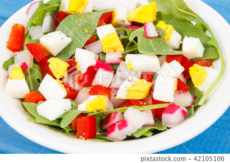 Fresh prepared salad with eggs and vegetables Fresh prepared salad with eggs and vegetables 42105106