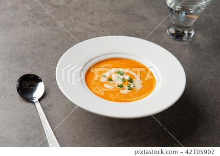 pumpkin soup with spices on table 42105907