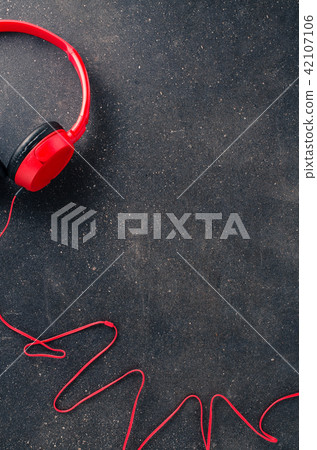 Headphones on dark background Headphones on dark background 42107106