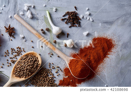 Culinary still life of assorted spices on white textured background, flat lay, close-up, selective 42108698
