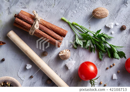 Culinary still life of assorted spices on white textured background, flat lay, close-up, selective 42108713