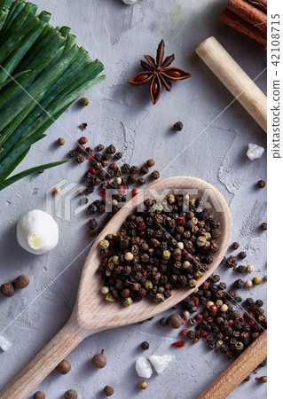 Culinary still life of assorted spices on white textured background, flat lay, close-up, selective Culinary still life of assorted spices on white textured background, flat lay, close-up, selective 42108715