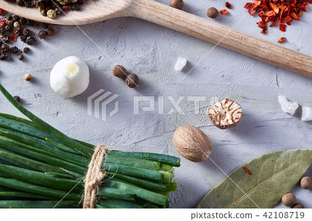Culinary still life of assorted spices on white textured background, flat lay, close-up, selective 42108719