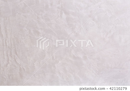 White plastered wall background with abstract pattern, close-up, macro. 42110279