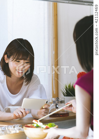 Woman cooking Woman cooking 42112469