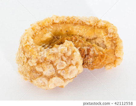 Pork rinds also known as chicharon or chicharrones Pork rinds also known as chicharon or chicharrones 42112558