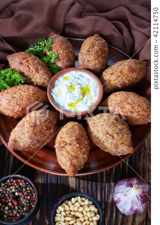 deep fried kibbeh of ground beef deep fried kibbeh of ground beef 42114750