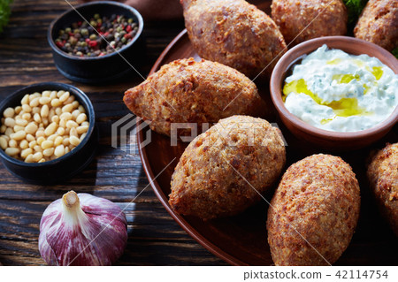 close-up of fried kibbeh on a plate close-up of fried kibbeh on a plate 42114754