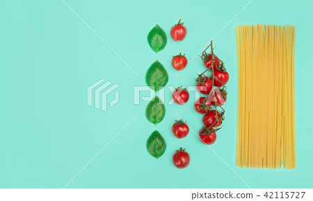 Italian pasta with tomatoes, grated parmesan and basil. 42115727