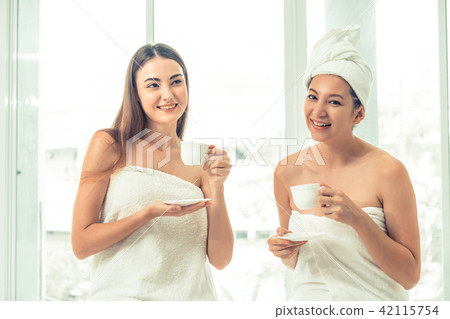Two women drinking tea in luxury day spa. 42115754