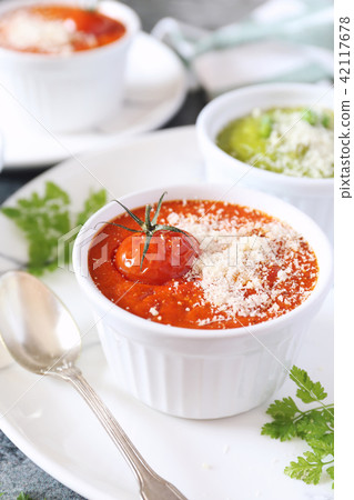 Vegetable appetizer: tomato flan and pea souffle 42117678
