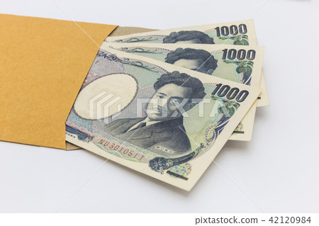 Japanese banknote 1,000 yen in brown envelope Japanese banknote 1,000 yen in brown envelope 42120984