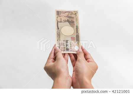 Businesswoman holding10,000 Japanese Yen money Businesswoman holding10,000 Japanese Yen money 42121001