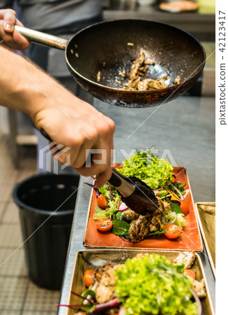Grilled Chicken Breast fillet with fresh tomatoes vegetables salad. concept healthy food made by Grilled Chicken Breast fillet with fresh tomatoes vegetables salad. concept healthy food made by 42123417
