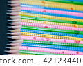 Row of colorful graphite sharpened pencil closeup  42123440