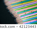Row of colorful graphite sharpened pencil closeup  42123443