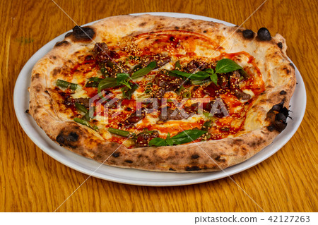 Pizza with beef Pizza with beef 42127263