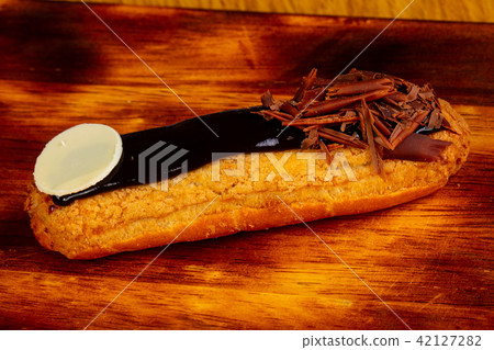 Eclair with cream Eclair with cream 42127282