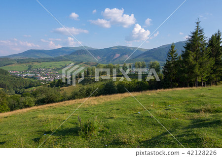 Magnificent landscape of mountain slopes and peaks Magnificent landscape of mountain slopes and peaks 42128226
