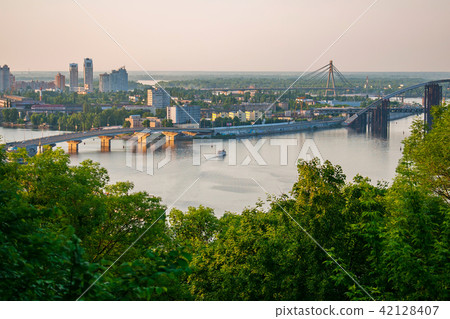 A panorama of town houses with bridges linking the 42128407