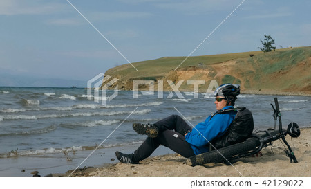 Fat bike also called fatbike or fat-tire bike in summer driving on the beach. Fat bike also called fatbike or fat-tire bike in summer driving on the beach. 42129022
